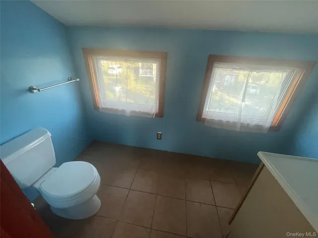 a front view of a house with a garage