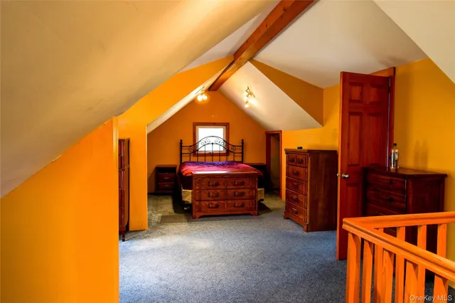 a kitchen with a sink appliances and cabinets