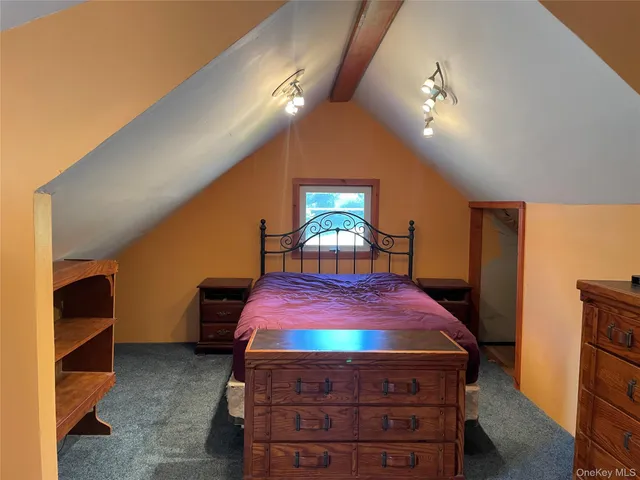 a view of a lake with a yard