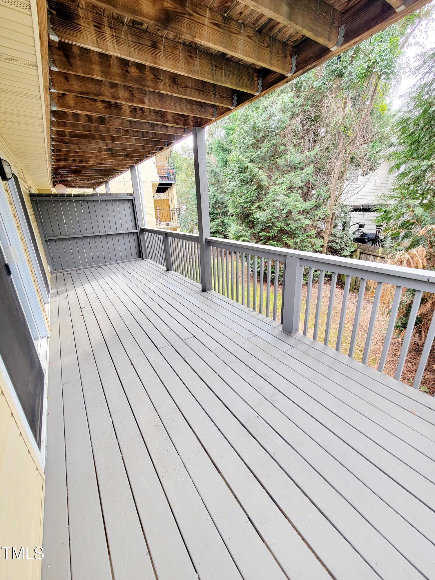 1422 Scales Street, Unit C Raleigh, NC 27608 - Photo 32 of 37 a view of balcony with wooden floor
