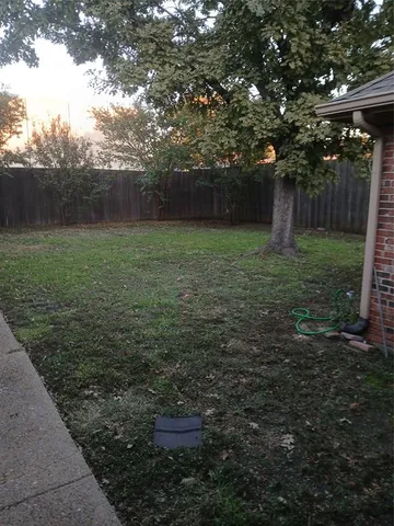 a view of a workspace with furniture
