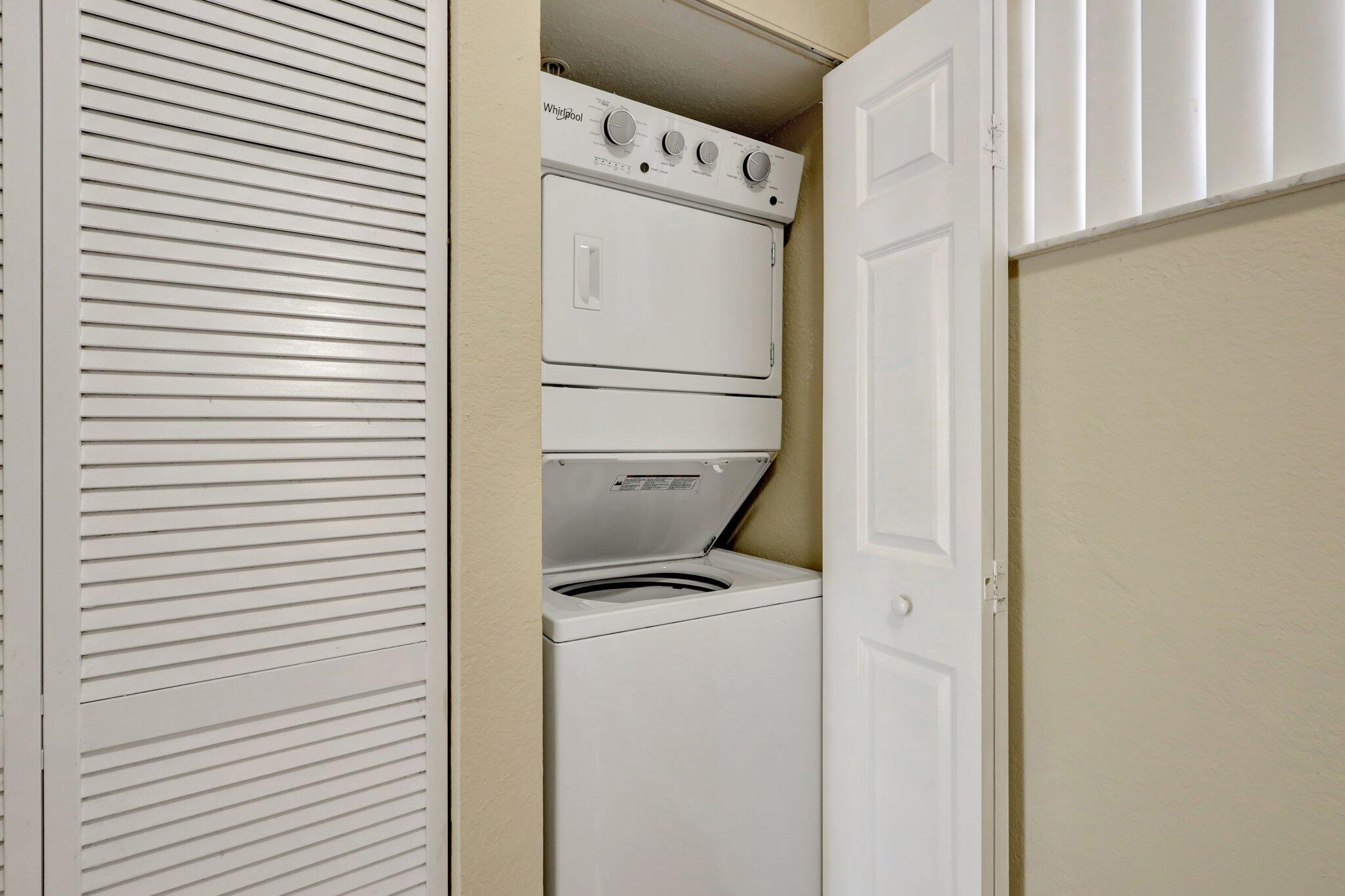 1964 Freeport Drive, Unit 1964 Riviera Beach, FL 33404 - Photo 5 of 20 a utility room with dryer and washer