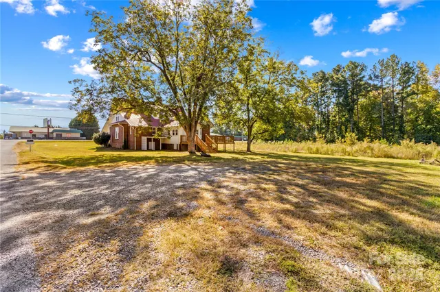 a view of swimming pool with an outdoor space and seating area