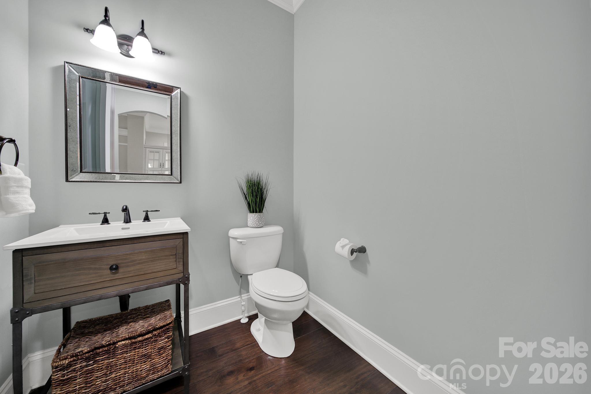 2112 Tatton Hall Road Fort Mill, SC 29715 - Photo 18 of 46 a bathroom with a toilet a sink and mirror
