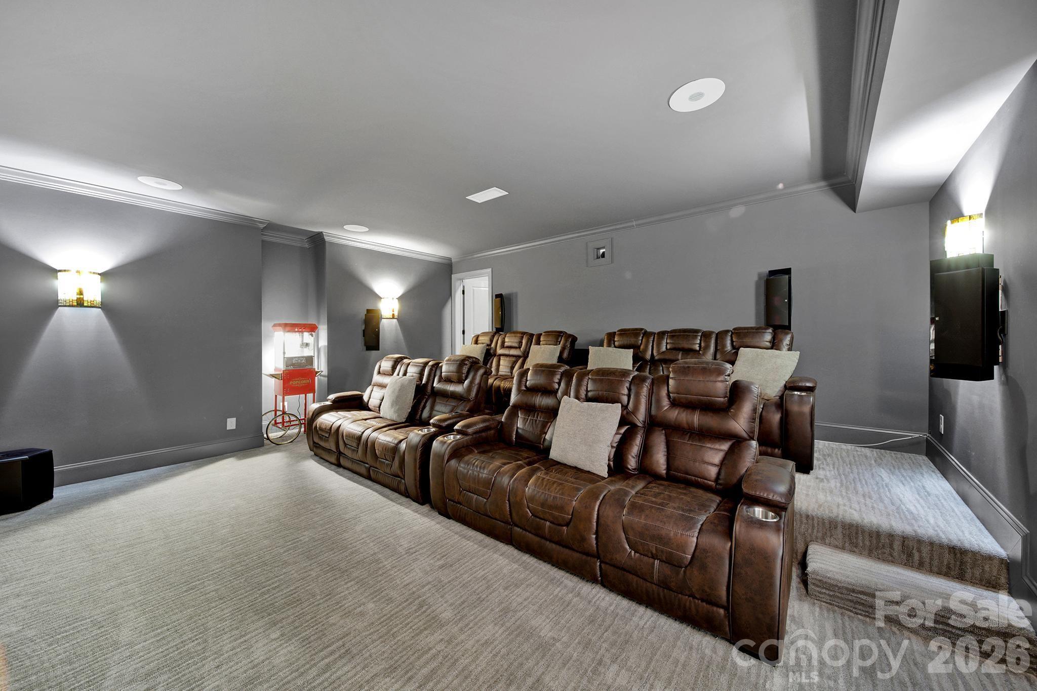 2112 Tatton Hall Road Fort Mill, SC 29715 - Photo 34 of 46 a large living room with couches and a flat screen tv