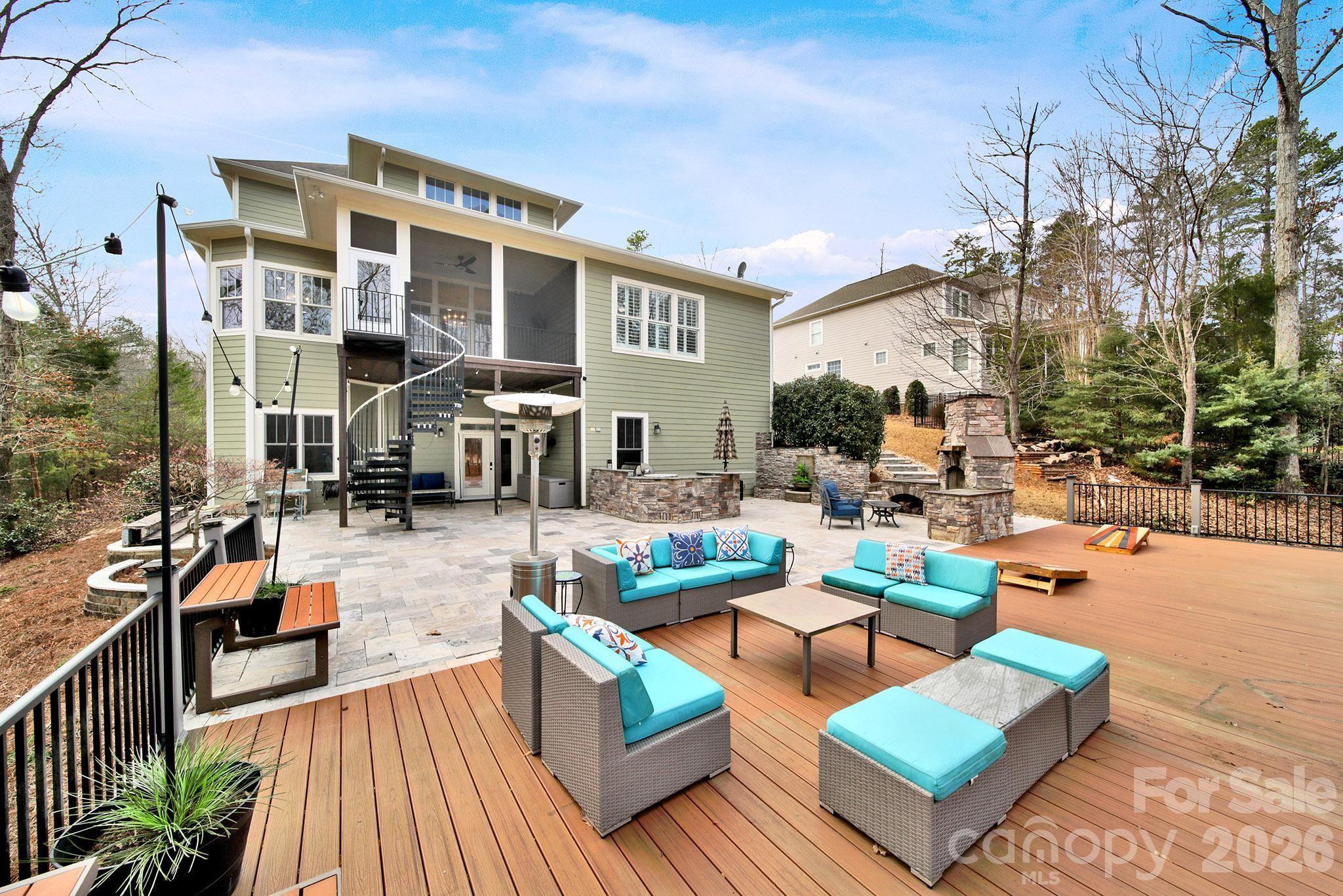 2112 Tatton Hall Road Fort Mill, SC 29715 - Photo 36 of 46 a view of a patio with couches and dining table with garden view