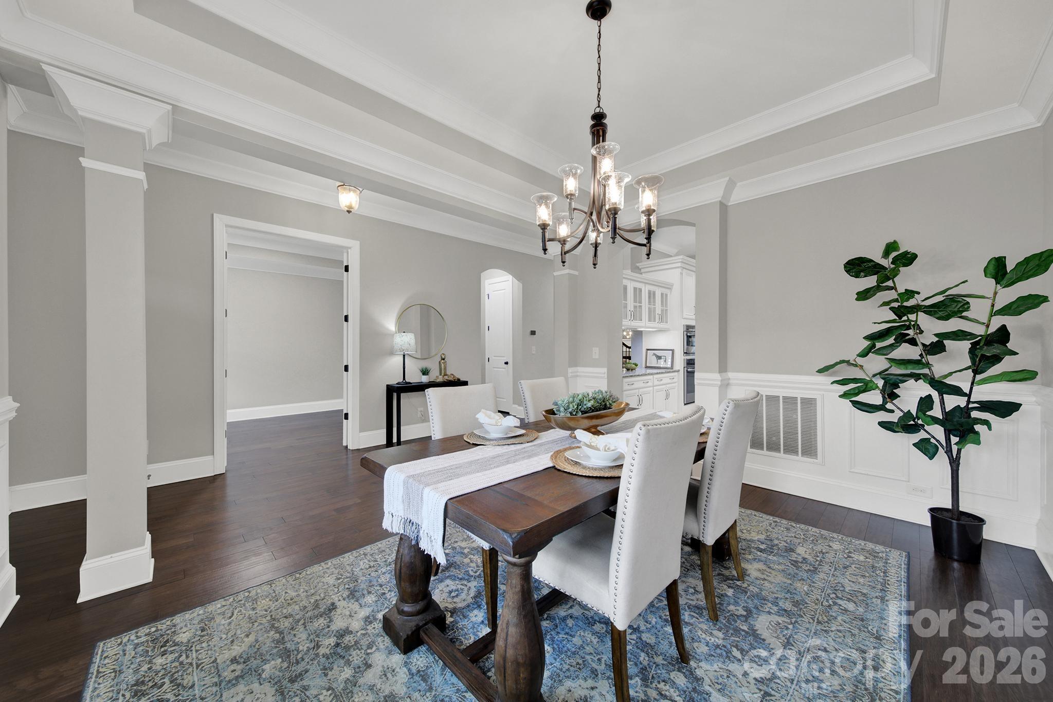 2112 Tatton Hall Road Fort Mill, SC 29715 - Photo 4 of 46 a view of a dining room with furniture and wooden floor