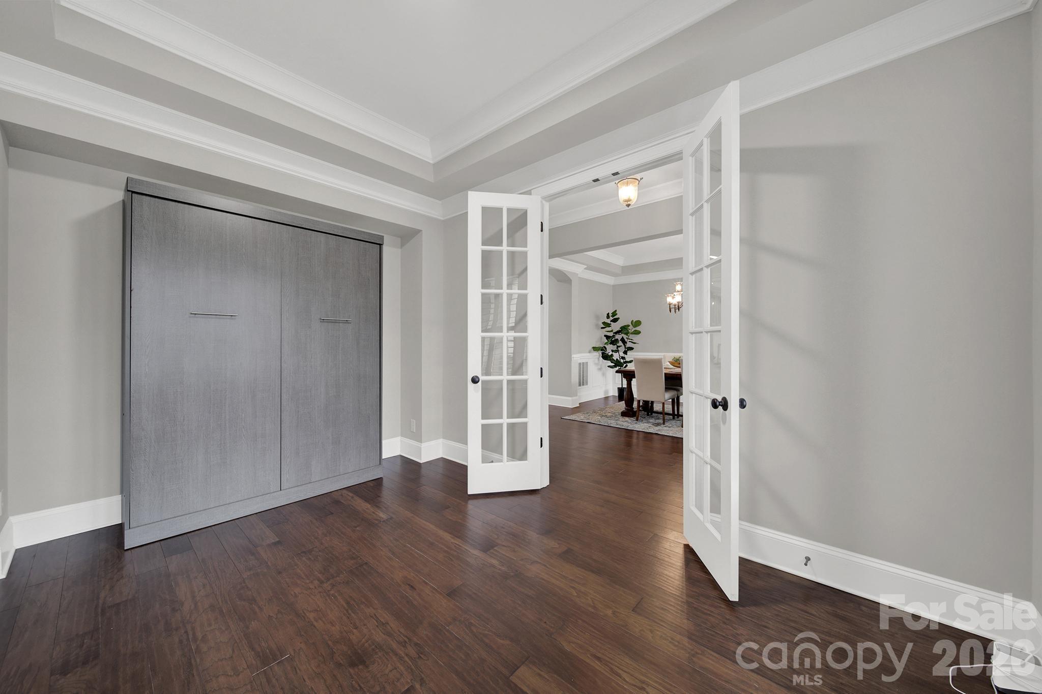 2112 Tatton Hall Road Fort Mill, SC 29715 - Photo 5 of 46 wooden floor in a hall with a window