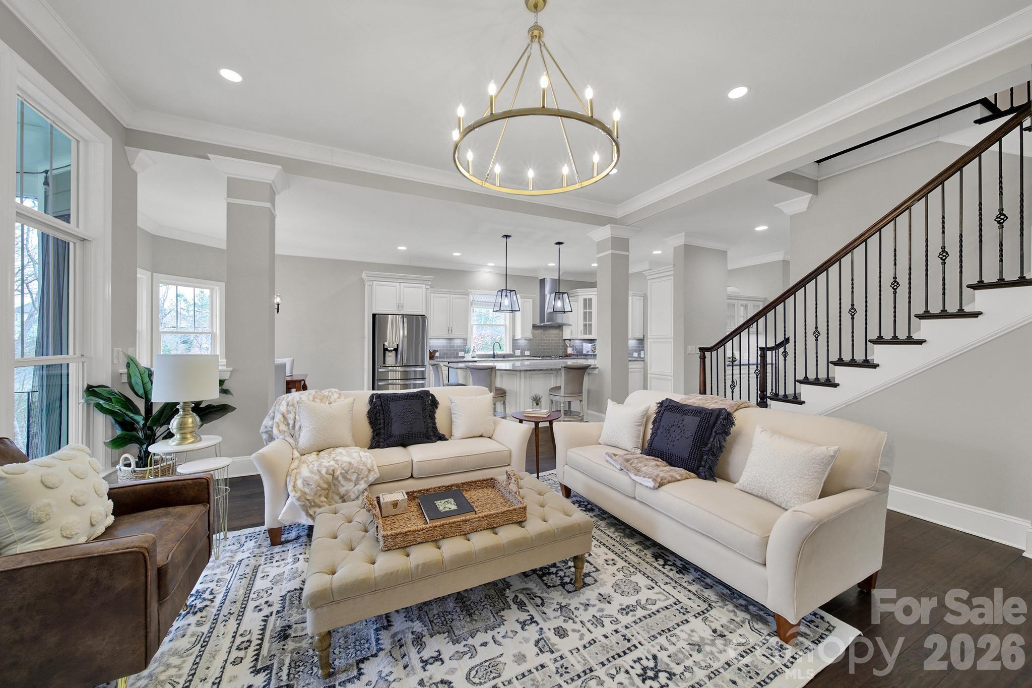 2112 Tatton Hall Road Fort Mill, SC 29715 - Photo 10 of 46 a living room with furniture kitchen and a table
