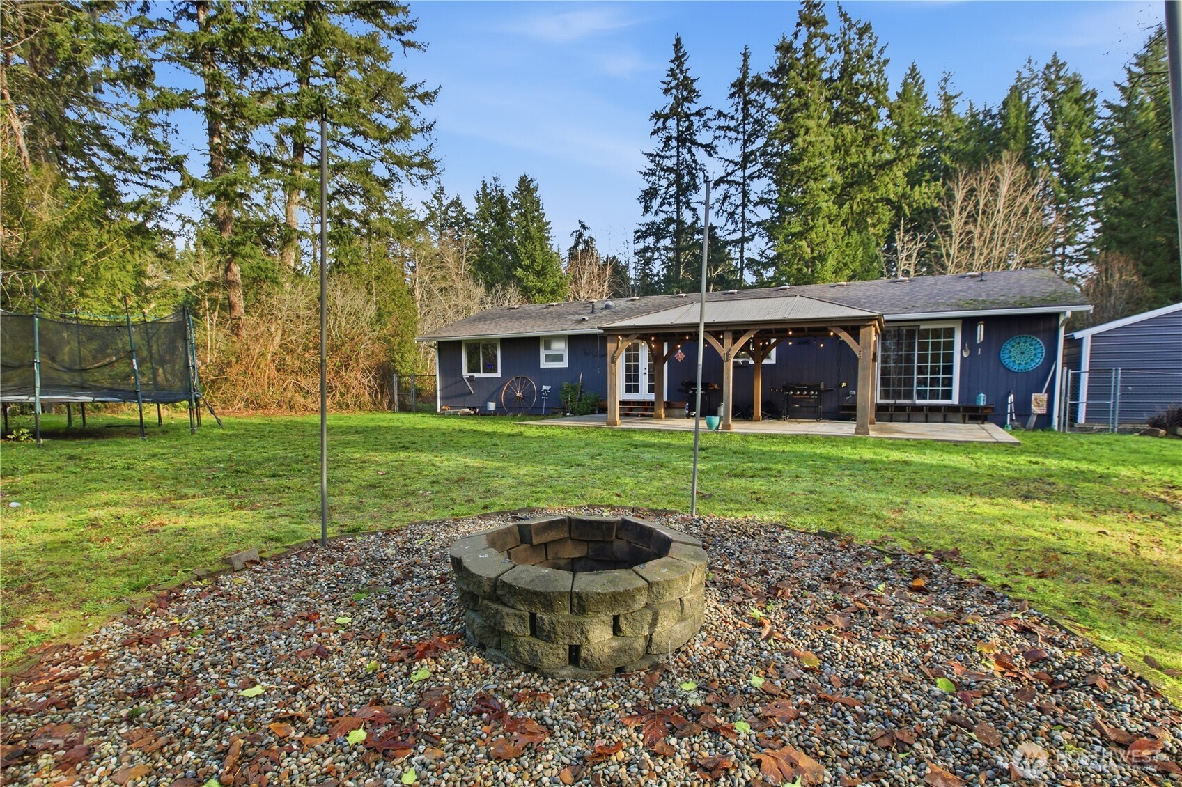 770 East Cedar Street Belfair, WA 98528 - Photo 28 of 31 a view of a house with backyard and sitting area