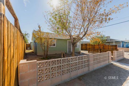 249 North Alvord Street Ridgecrest, CA 93555 - Photo 25 of 39 a front view of house with yard