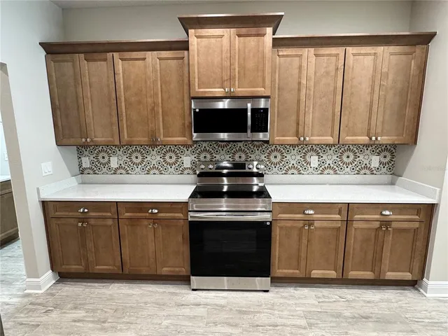 an aerial view of house with yard