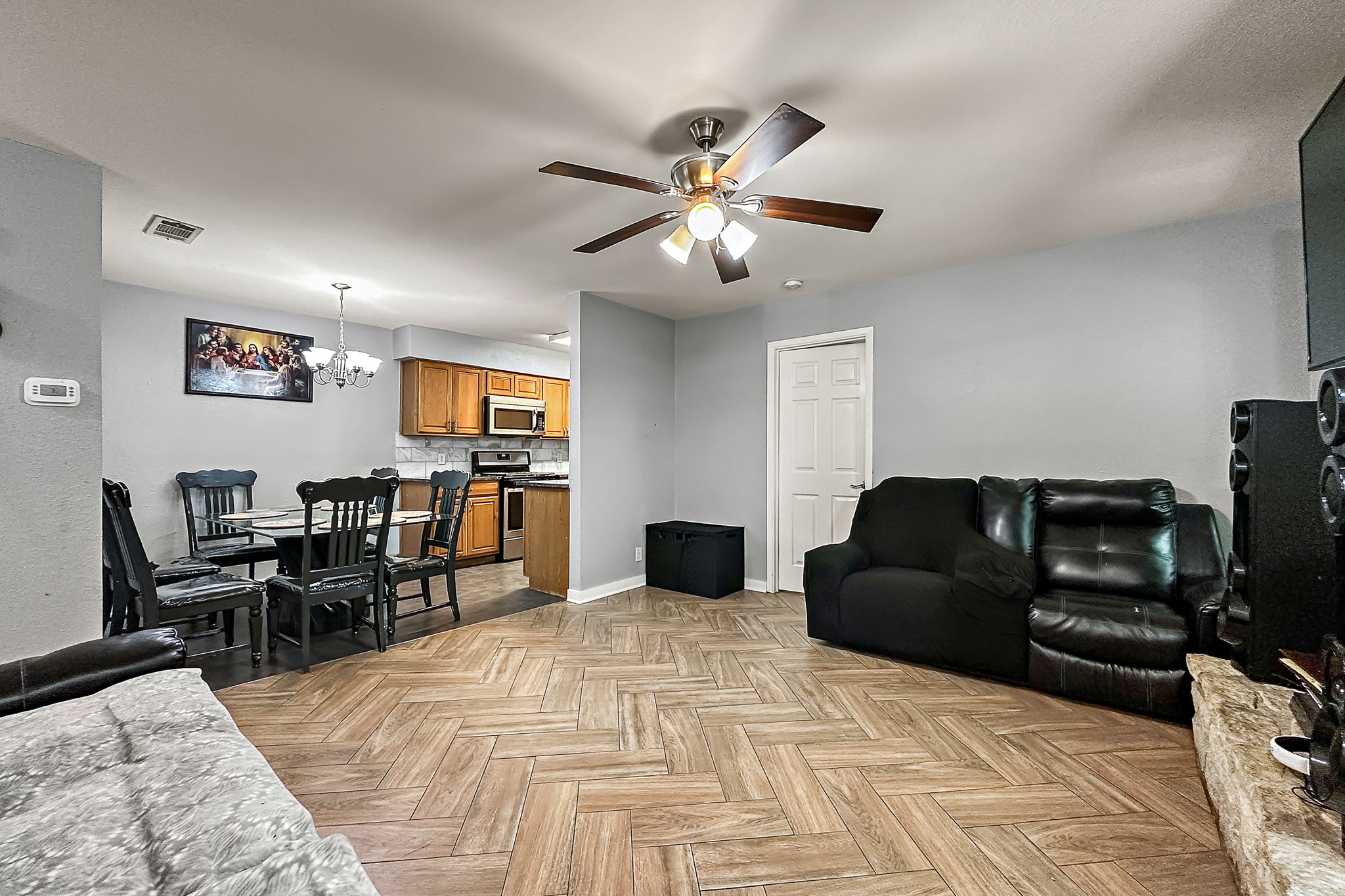 700 Misty Morning Way Round Rock, TX 78664 - Photo 6 of 36 Unit B - Open concept living area, seamlessly connecting to the kitchen.kitchen in this inviting open-concept space.