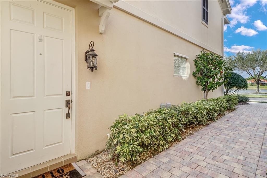 8028 Josefa Way Naples, FL 34114 - Photo 23 of 27 a bathroom with a shower