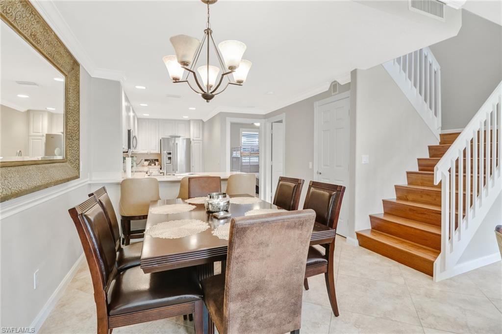 8028 Josefa Way Naples, FL 34114 - Photo 7 of 27 a view of a dining room with furniture