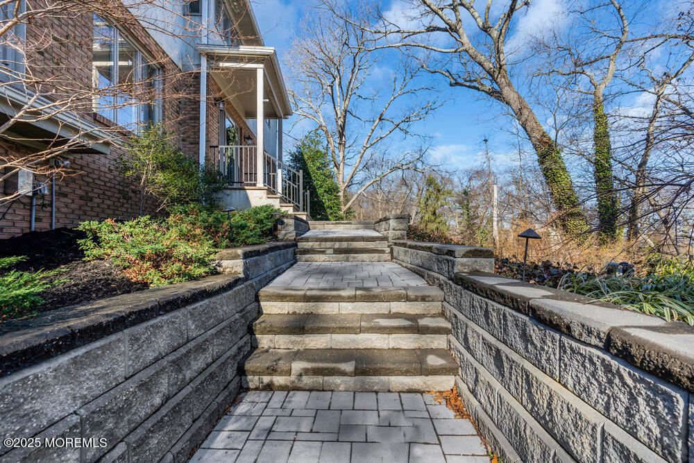 31 Lower Prospect Road Atlantic Highlands, NJ 07716 - Photo 8 of 67 a view of a pathway with a yard