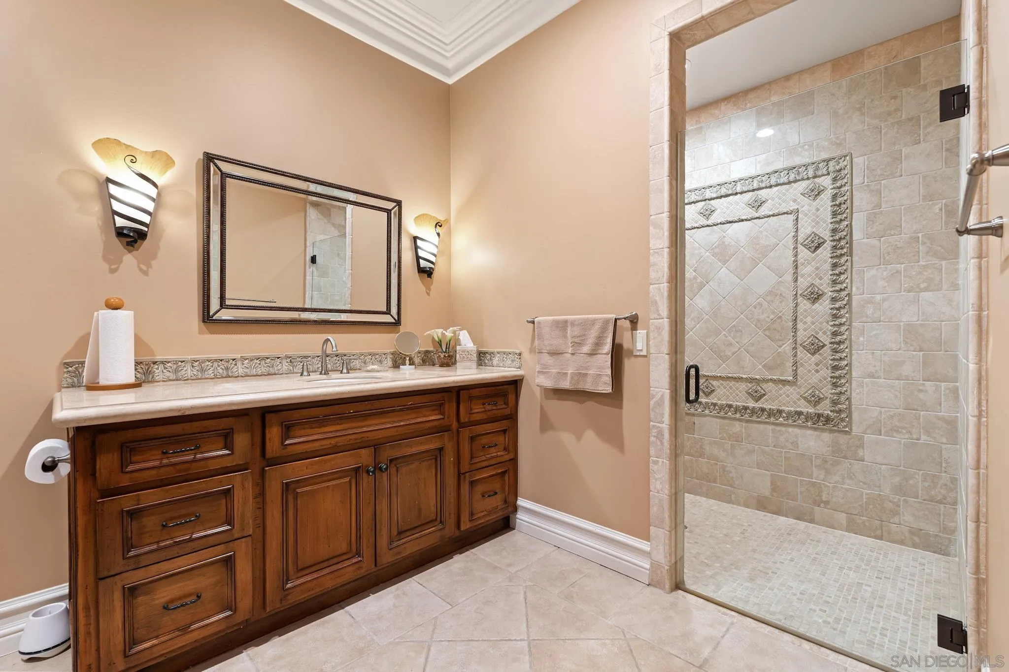 18486 Via Candela Rancho Santa Fe, CA 92091 - Photo 20 of 34 a bathroom with a granite countertop sink mirror and a