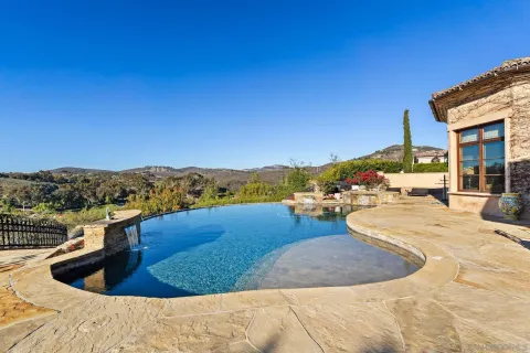 a view of a water with a mountain in the background