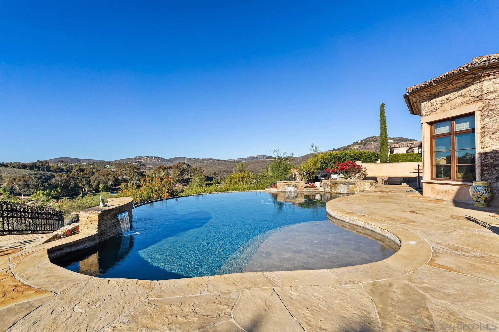 18486 Via Candela Rancho Santa Fe, CA 92091 - Photo 28 of 34 a view of a swimming pool with an ocean view