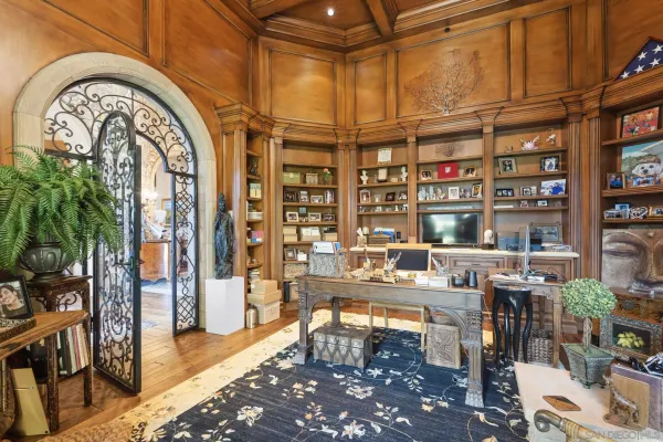 a very nice looking room with lots of furniture and plants