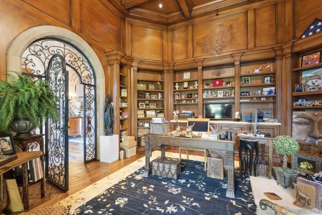 a very nice looking room with lots of furniture and plants