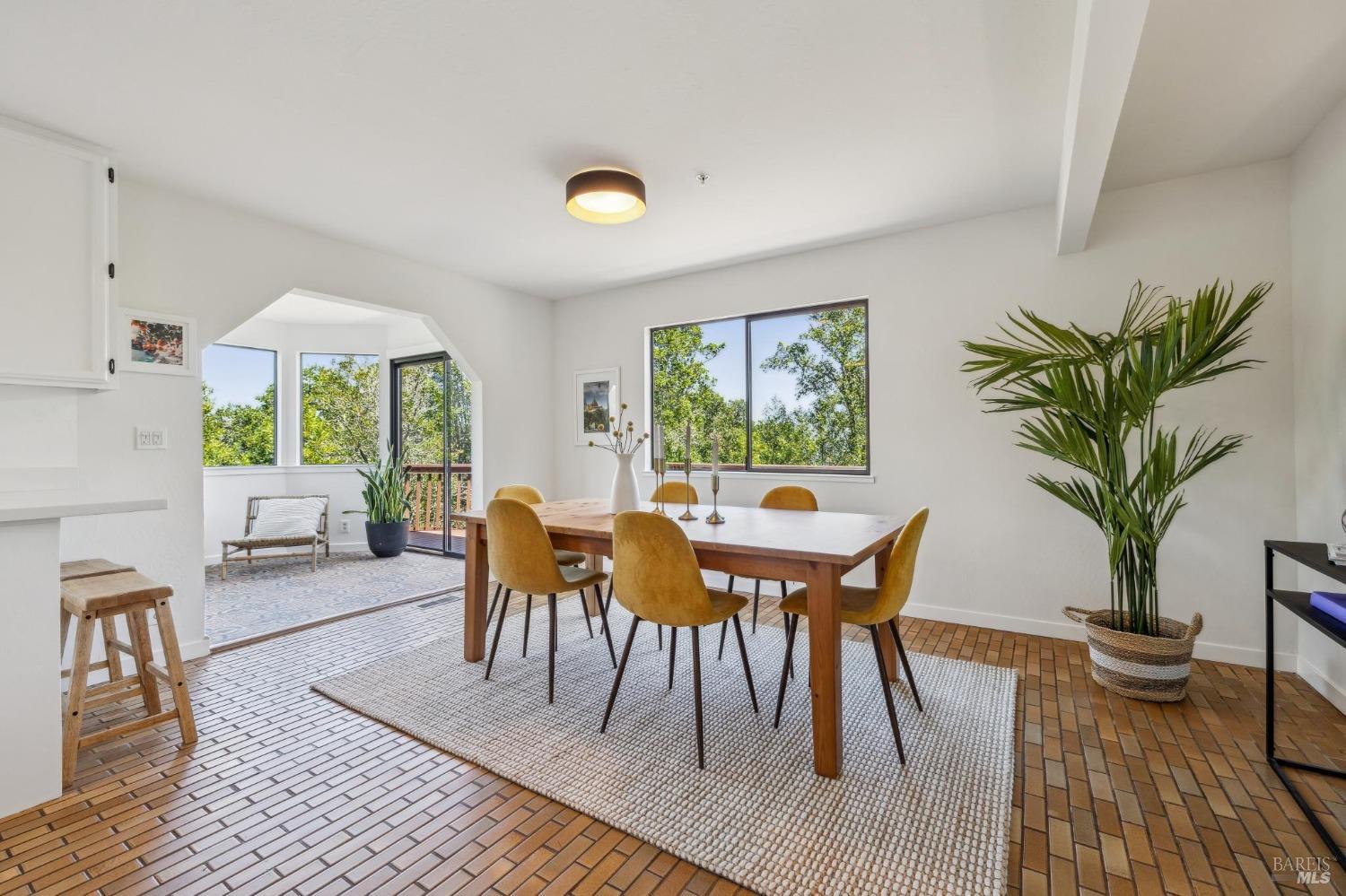 480 Live Oak Drive Mill Valley, CA 94941 - Photo 28 of 71 a dining room with furniture window and wooden floor
