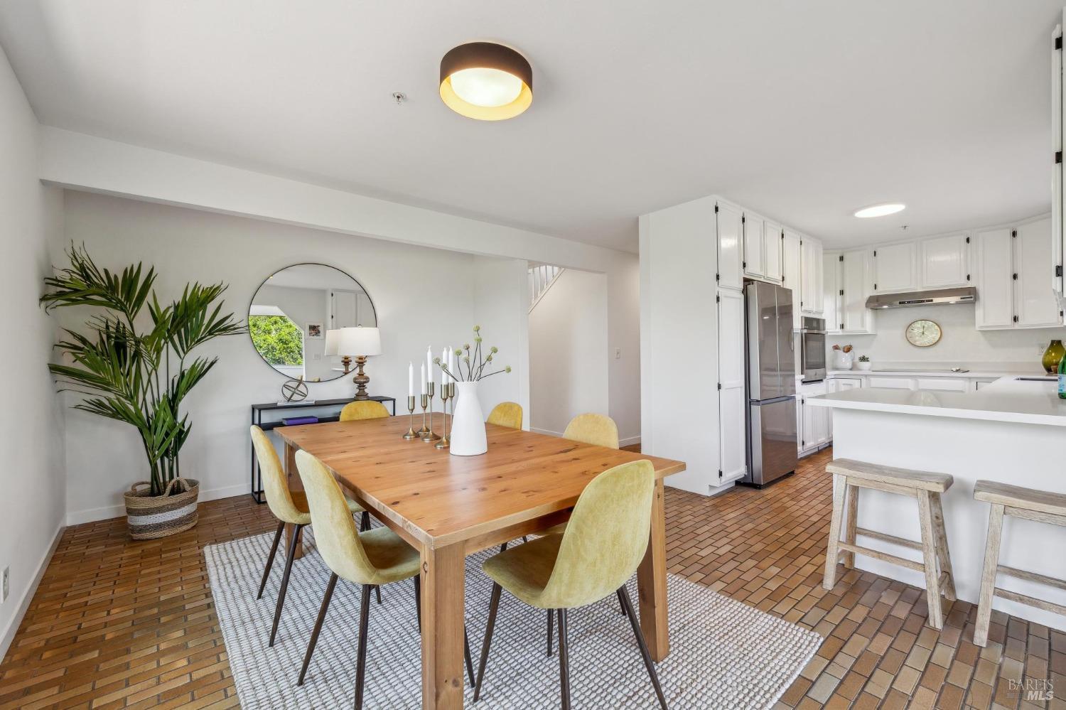 480 Live Oak Drive Mill Valley, CA 94941 - Photo 31 of 71 a view of a dining room with furniture and wooden floor