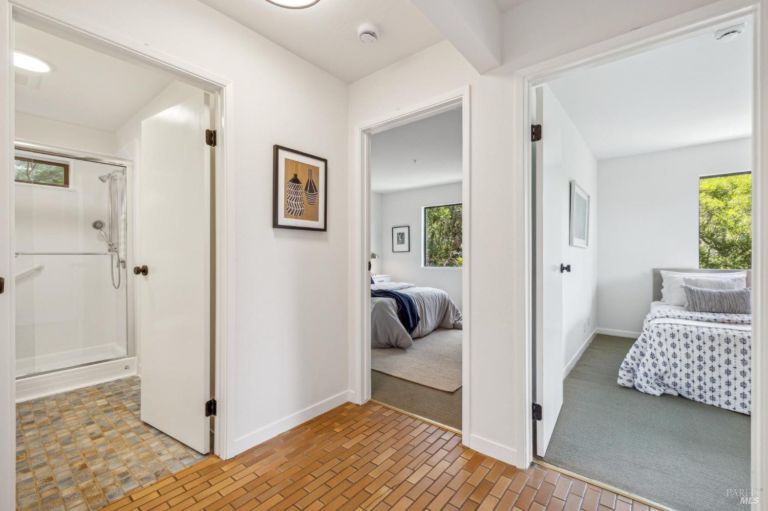 480 Live Oak Drive Mill Valley, CA 94941 - Photo 41 of 71 a bedroom with a bed and a view of en suite bathroom