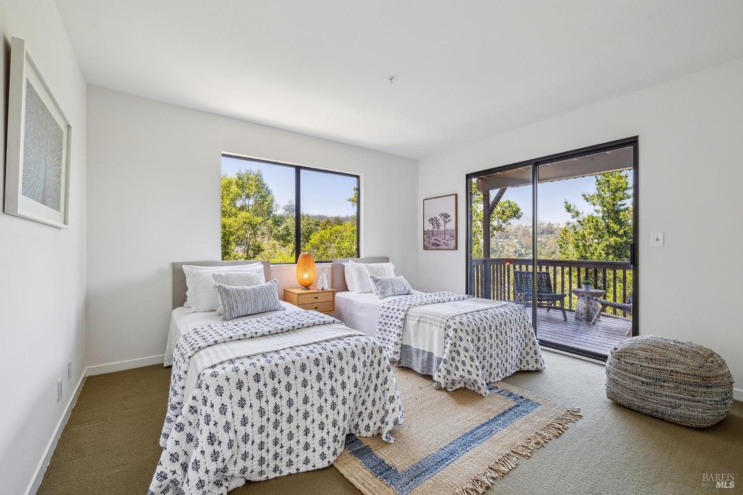 480 Live Oak Drive Mill Valley, CA 94941 - Photo 42 of 71 a bedroom with two beds and a large window