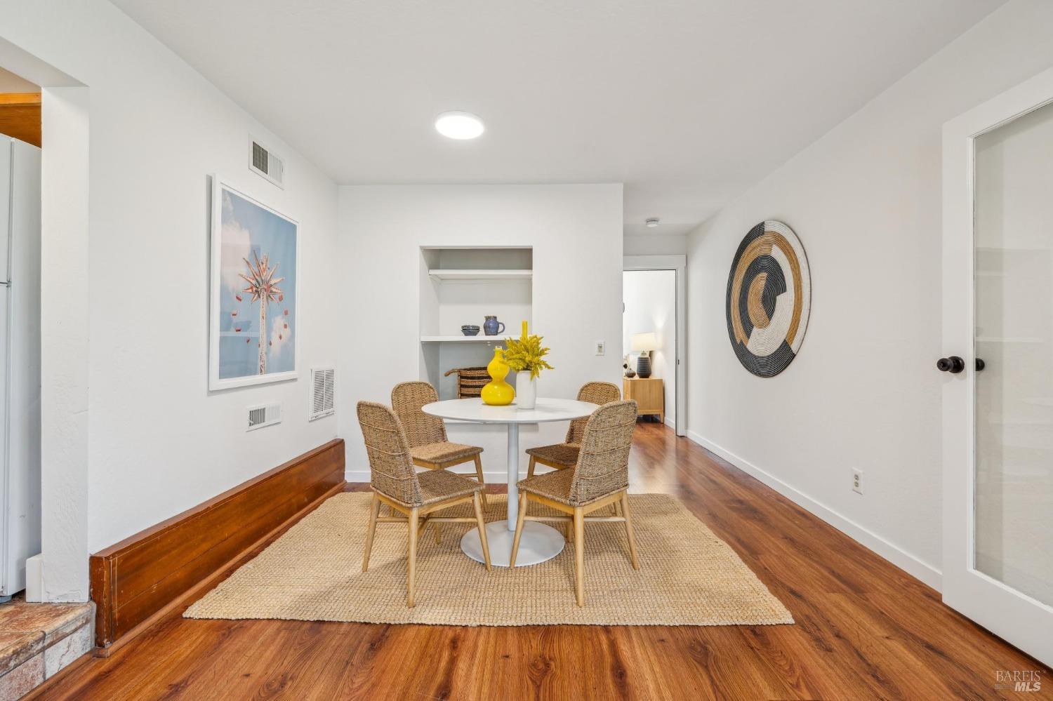 480 Live Oak Drive Mill Valley, CA 94941 - Photo 50 of 71 a dining room with furniture and a wooden floor