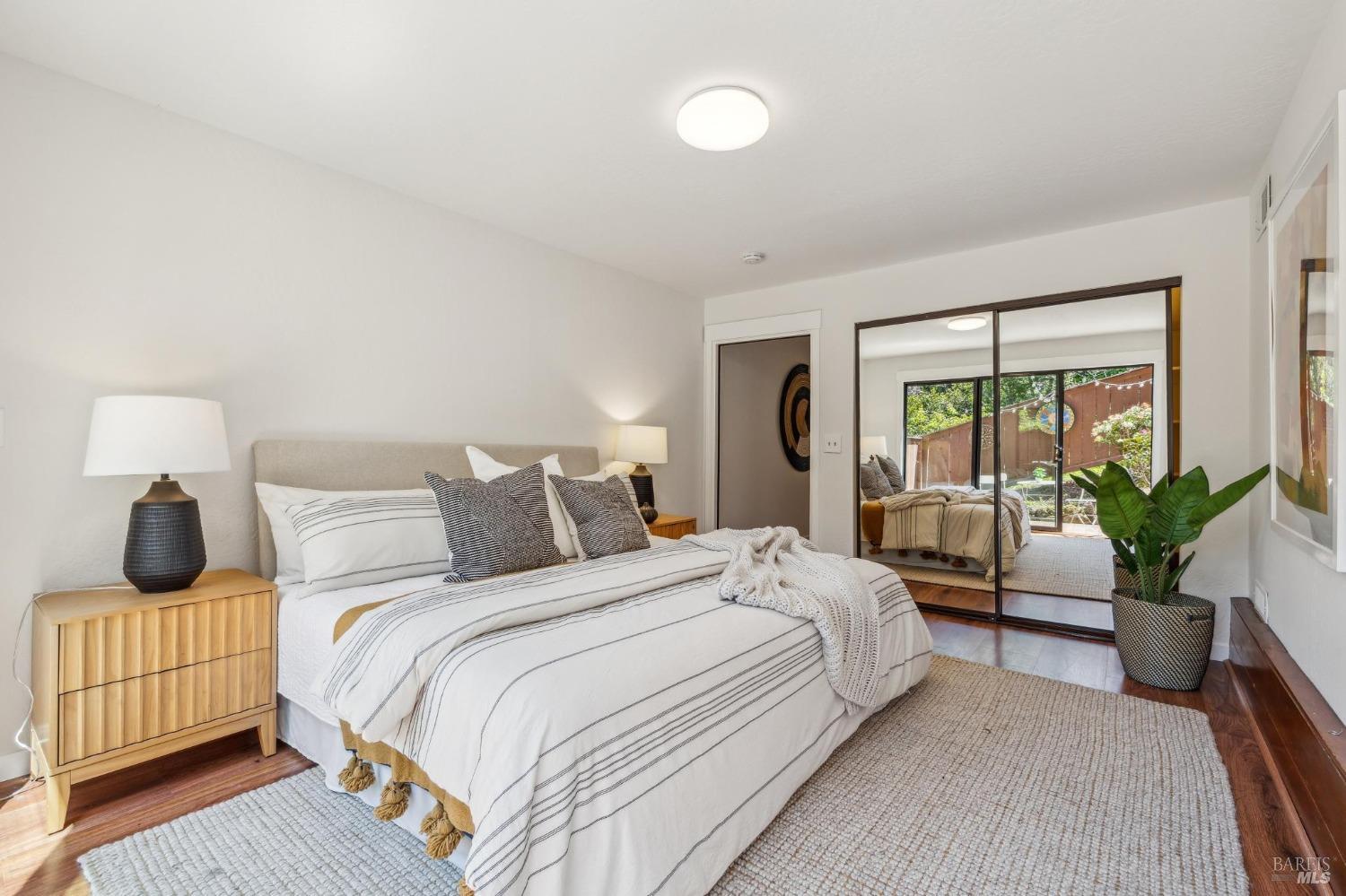 480 Live Oak Drive Mill Valley, CA 94941 - Photo 56 of 71 a bedroom with a bed and large window