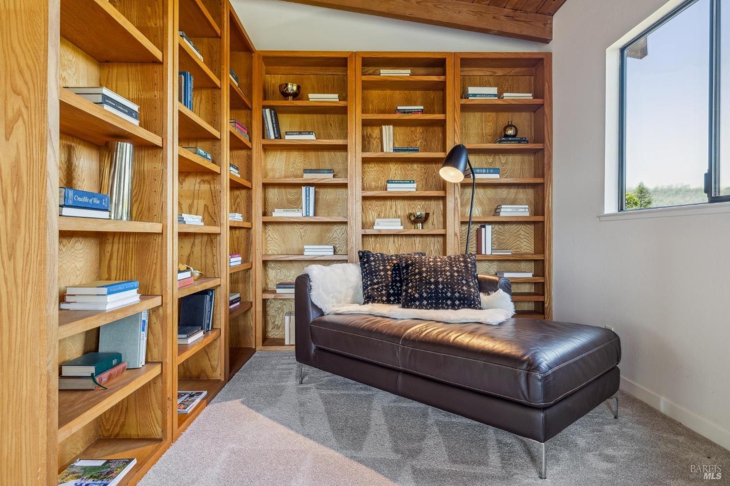 480 Live Oak Drive Mill Valley, CA 94941 - Photo 6 of 71 a living room with furniture cabinets and a book shelf