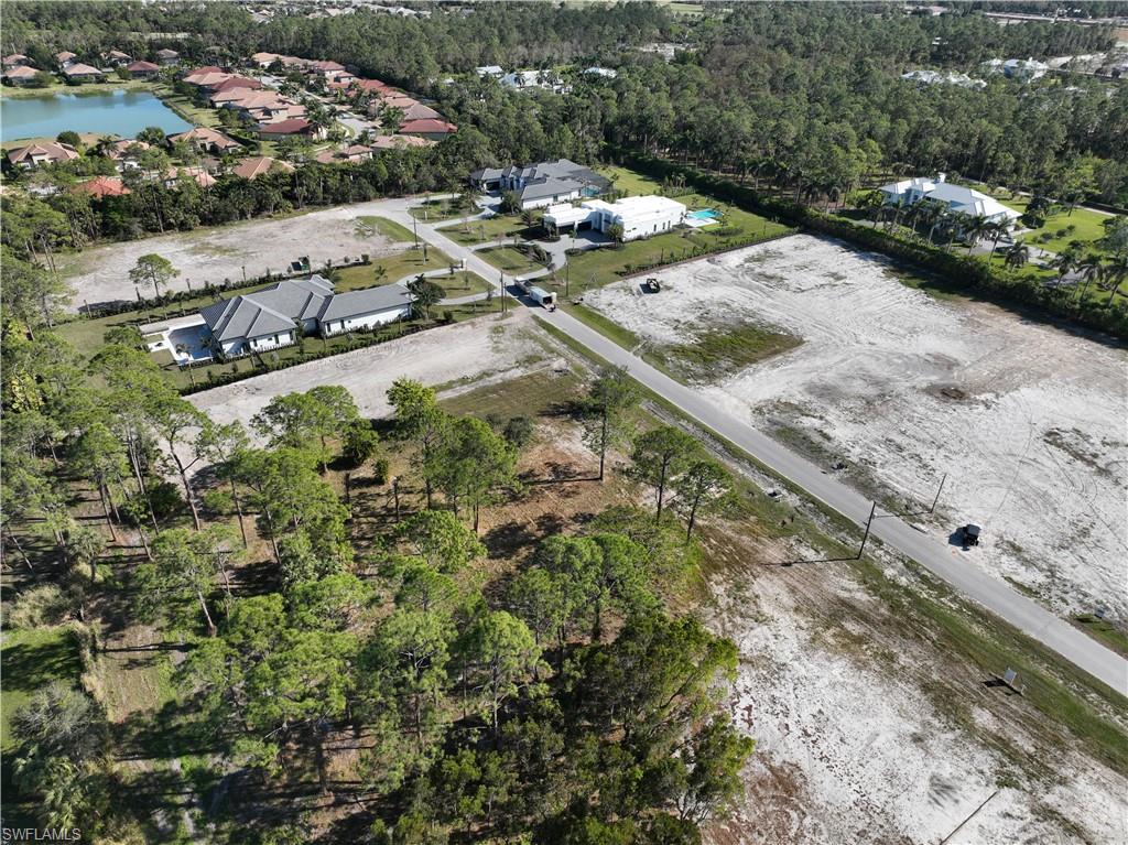 3062 Ravenna Avenue Naples, FL 34102 - Photo 5 of 7 an aerial view of a residential houses with outdoor space
