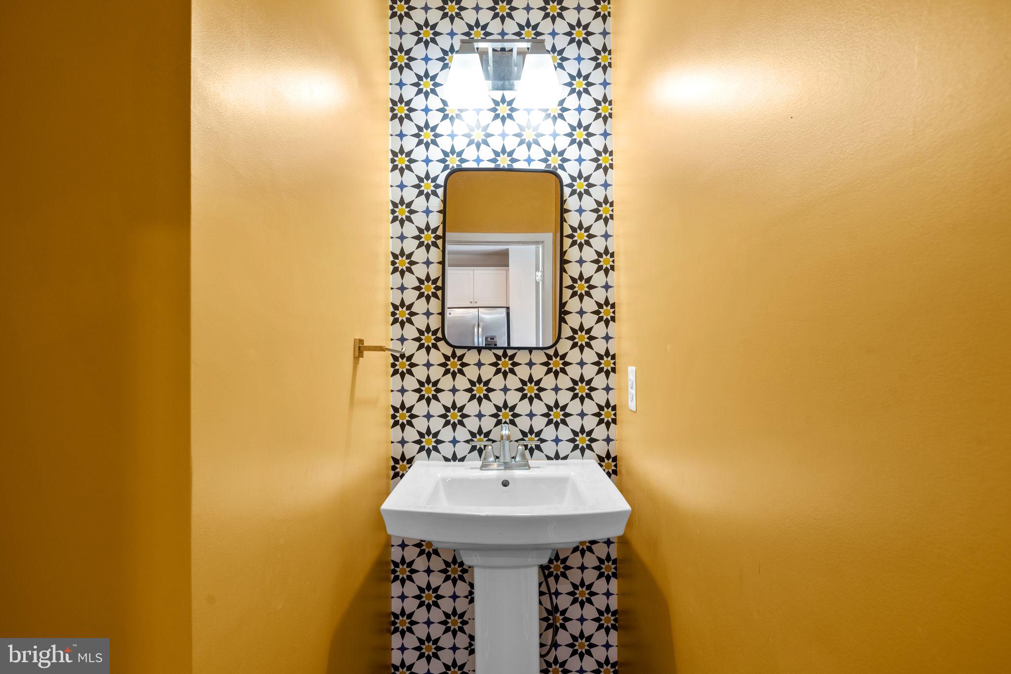 7023 Van Dusen Road Laurel, MD 20707 - Photo 19 of 46 Main Level Half Bathroom