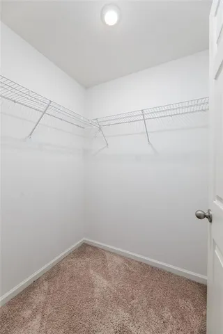 a swimming pool with an outdoor seating