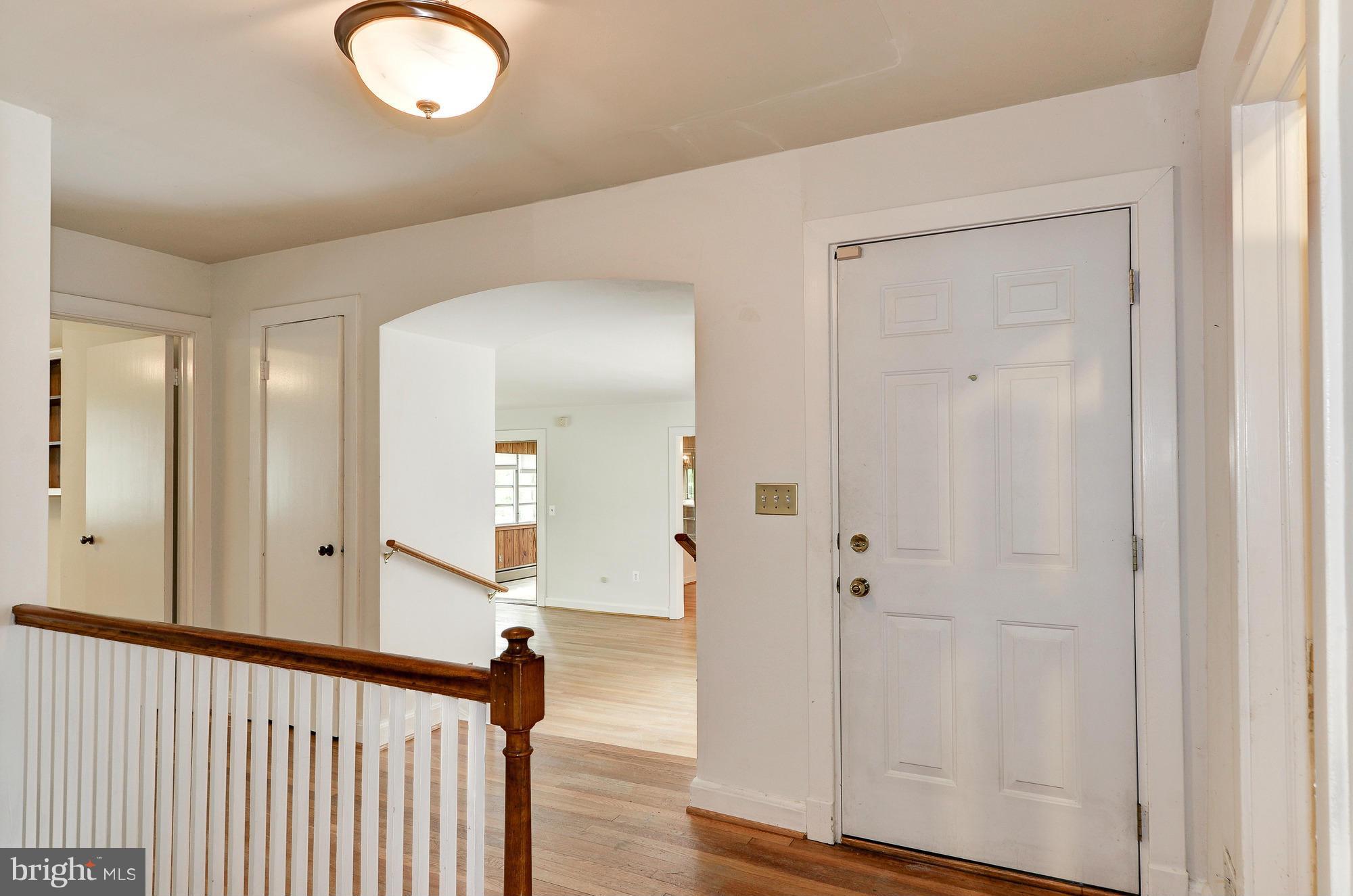 3238 Park View Road Chevy Chase, MD 20815 - Photo 2 of 28 a view of a hallway with wooden floor