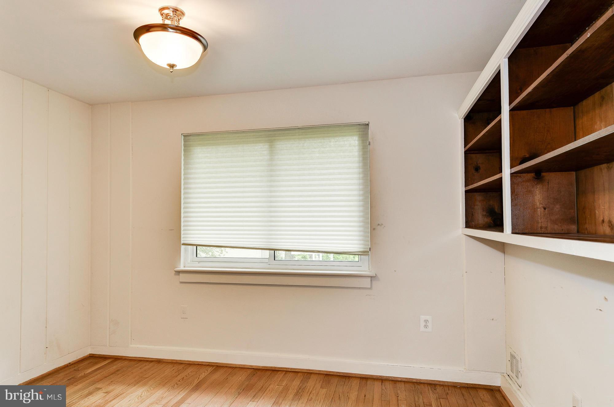 3238 Park View Road Chevy Chase, MD 20815 - Photo 13 of 28 a view of an empty room with a window