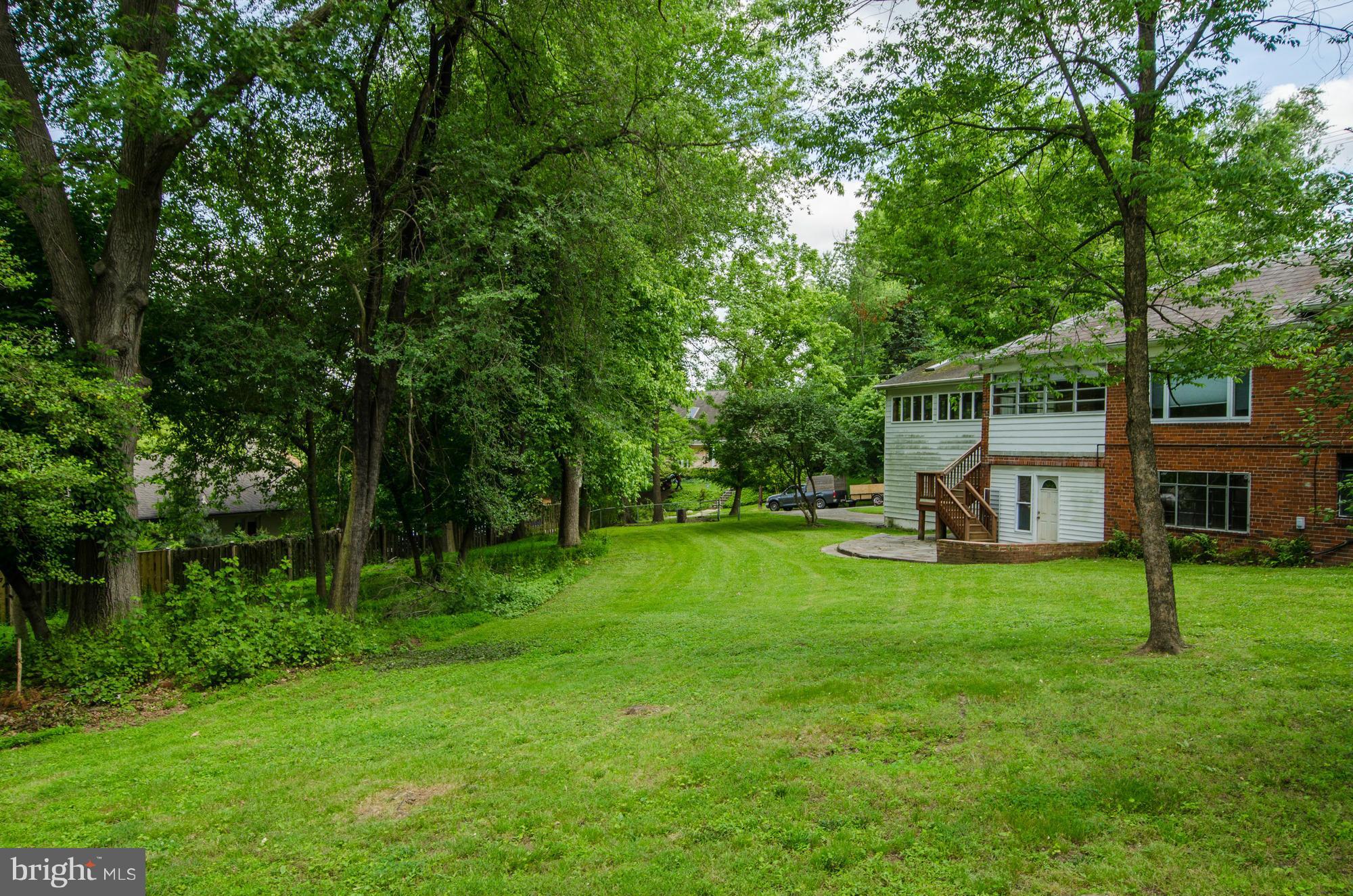3238 Park View Road Chevy Chase, MD 20815 - Photo 25 of 28 a view of a house with a backyard