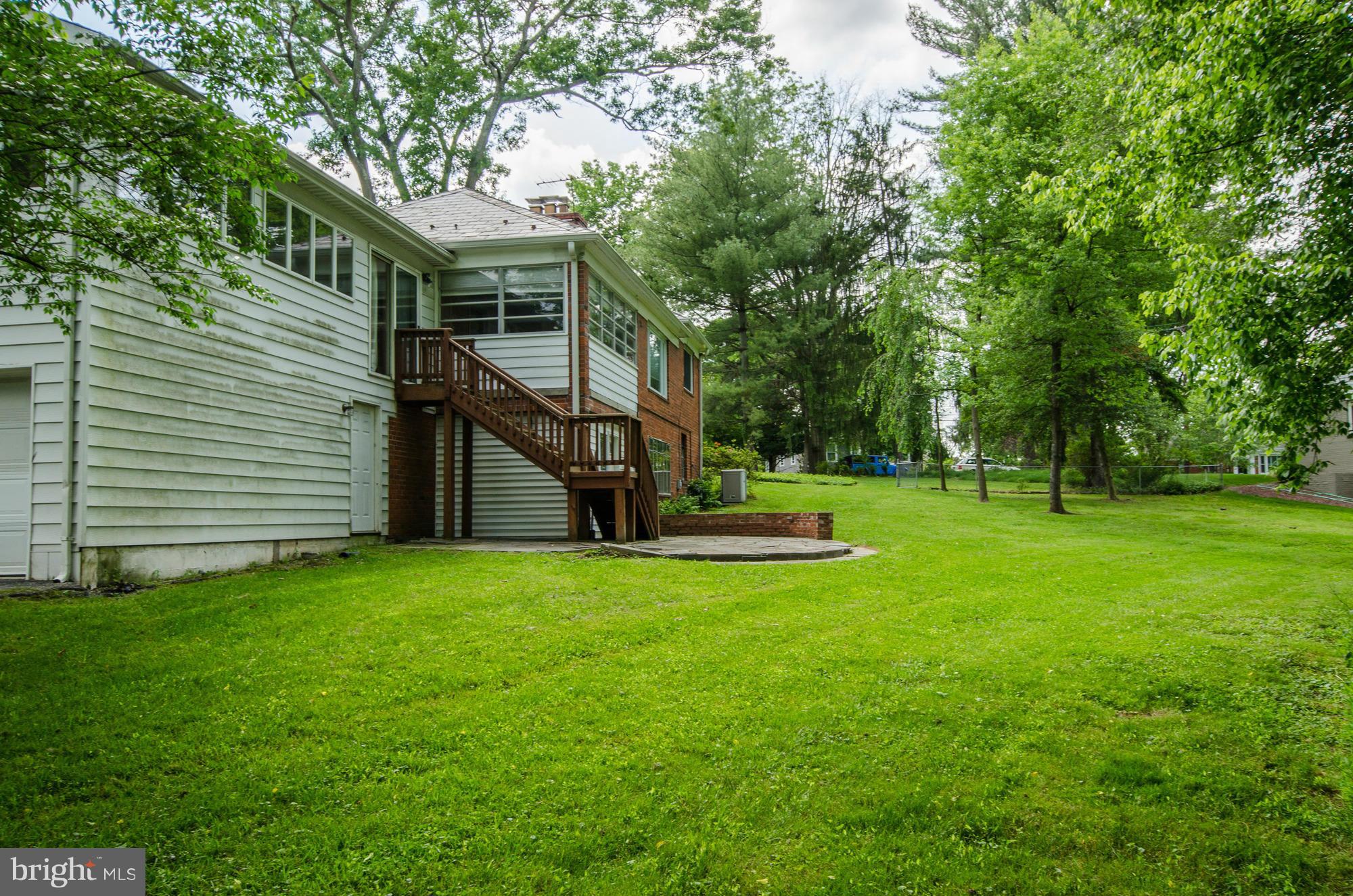 3238 Park View Road Chevy Chase, MD 20815 - Photo 27 of 28 a view of a house with backyard and a tree