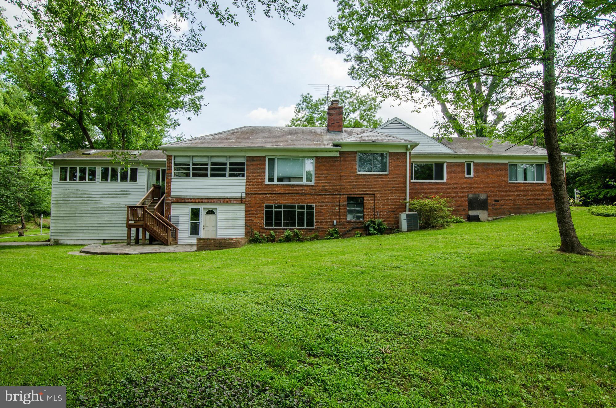 3238 Park View Road Chevy Chase, MD 20815 - Photo 28 of 28 a front view of house with yard and green space
