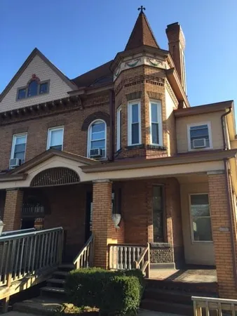 front view of a house with a balcony