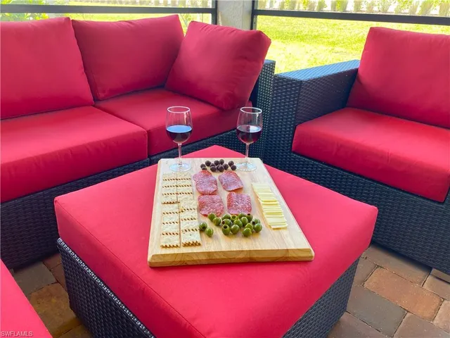 a blue bed sitting in a blue bed next to a window
