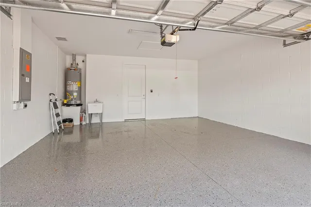 a blue chair sitting in front of a building with city view