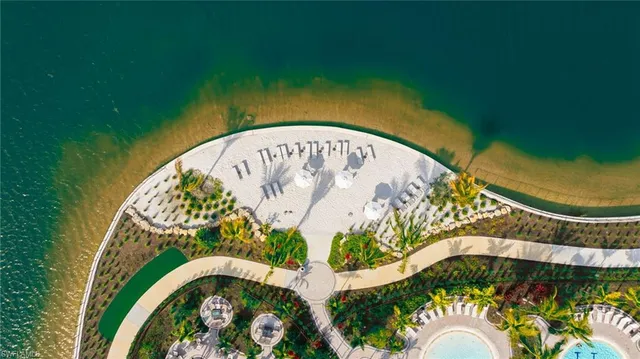 a view of a lake with a building in the background