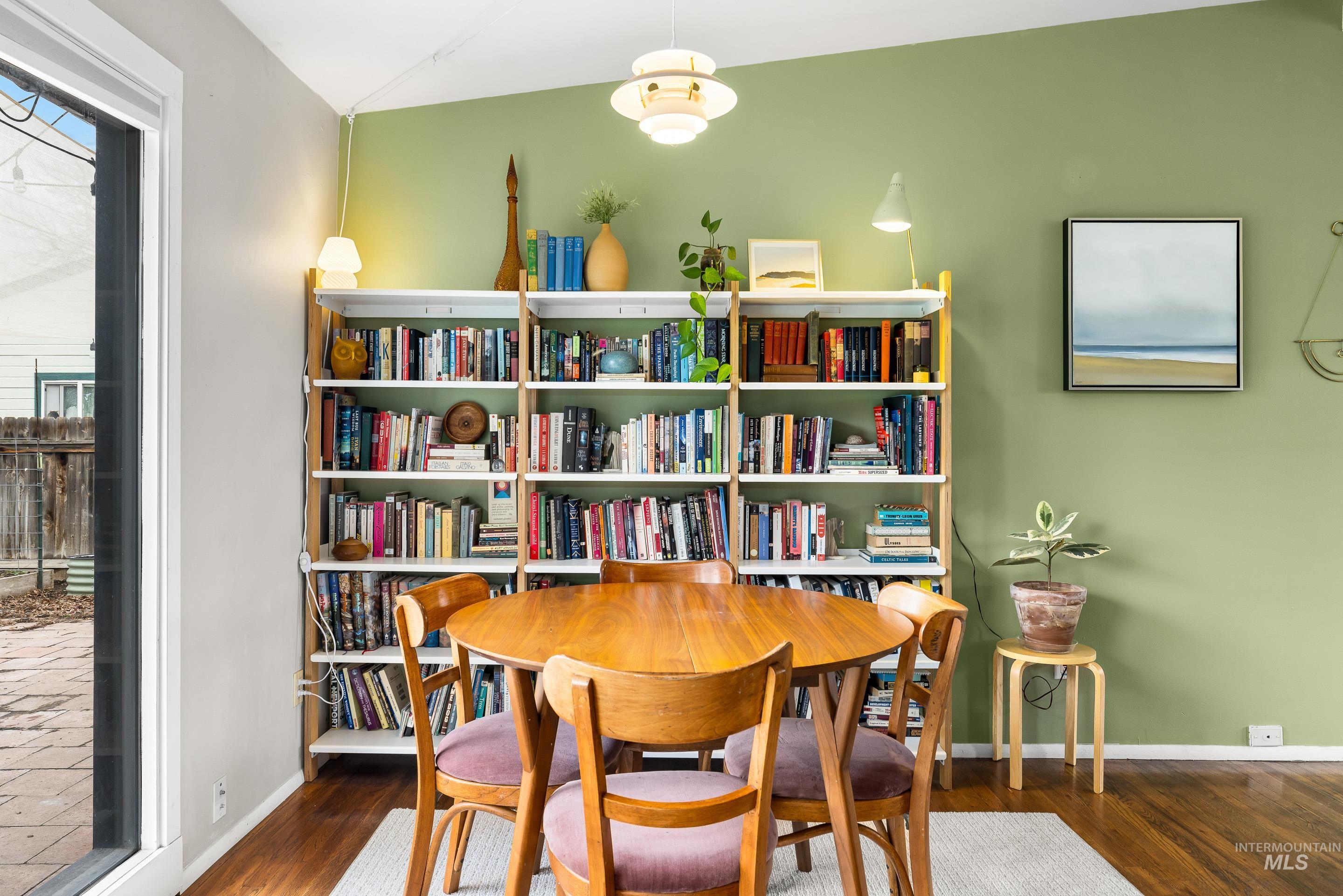 2824 West Kathryn Street Boise, ID 83705 - Photo 13 of 40 Dining area with dark wood-type flooring and baseboards