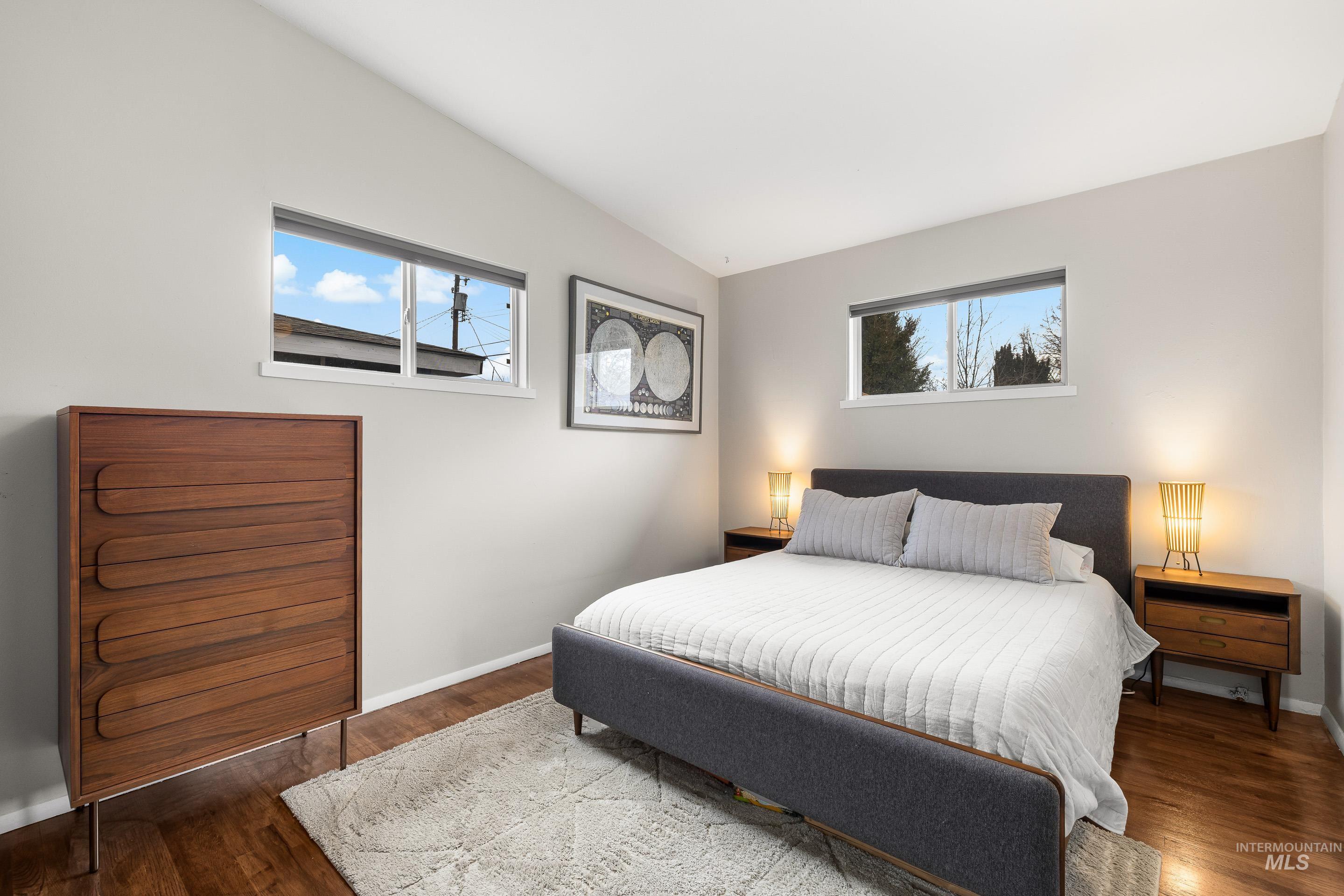 2824 West Kathryn Street Boise, ID 83705 - Photo 26 of 40 Bedroom with vaulted ceiling and wood finished floors