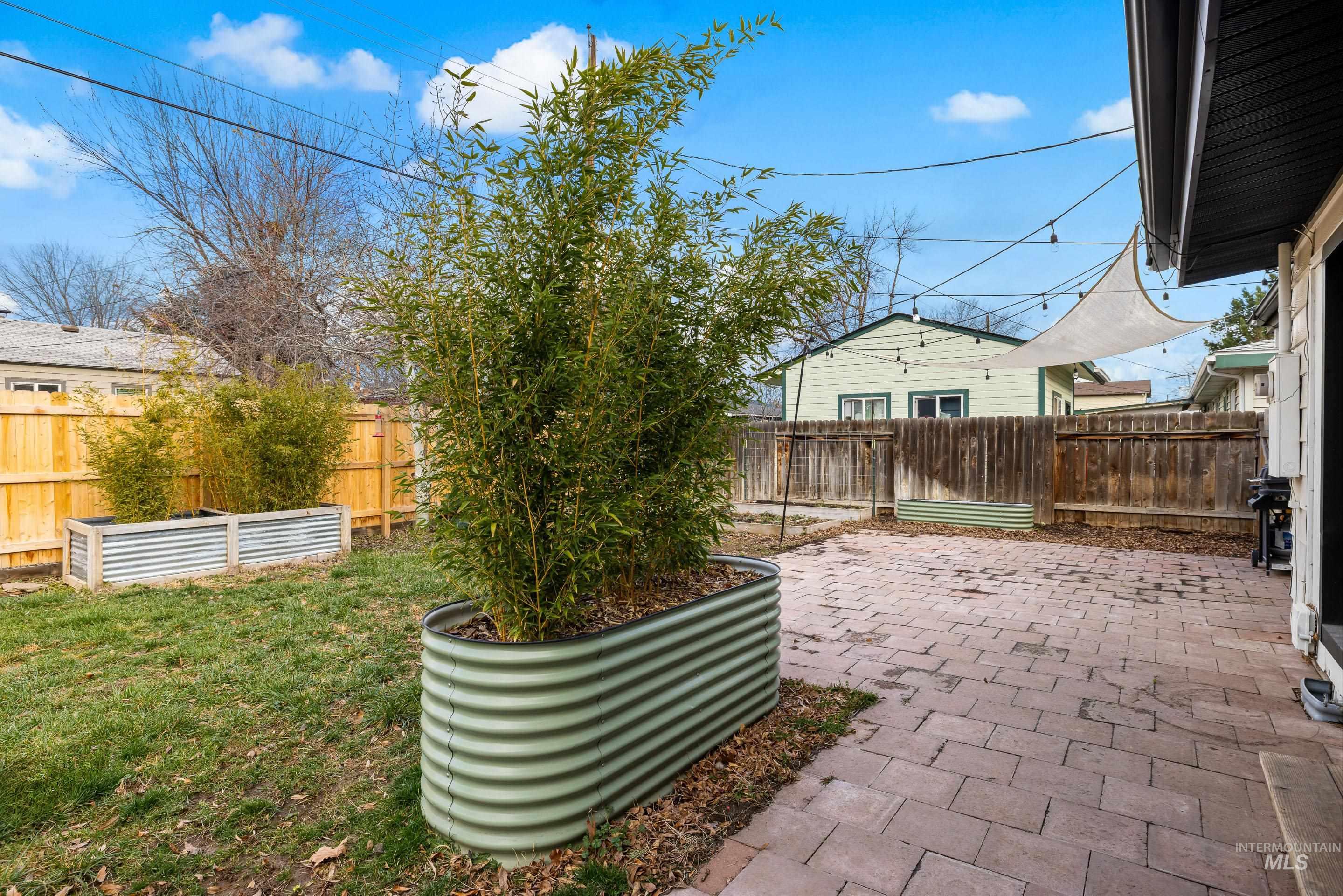 2824 West Kathryn Street Boise, ID 83705 - Photo 40 of 40 Fenced backyard with a patio area