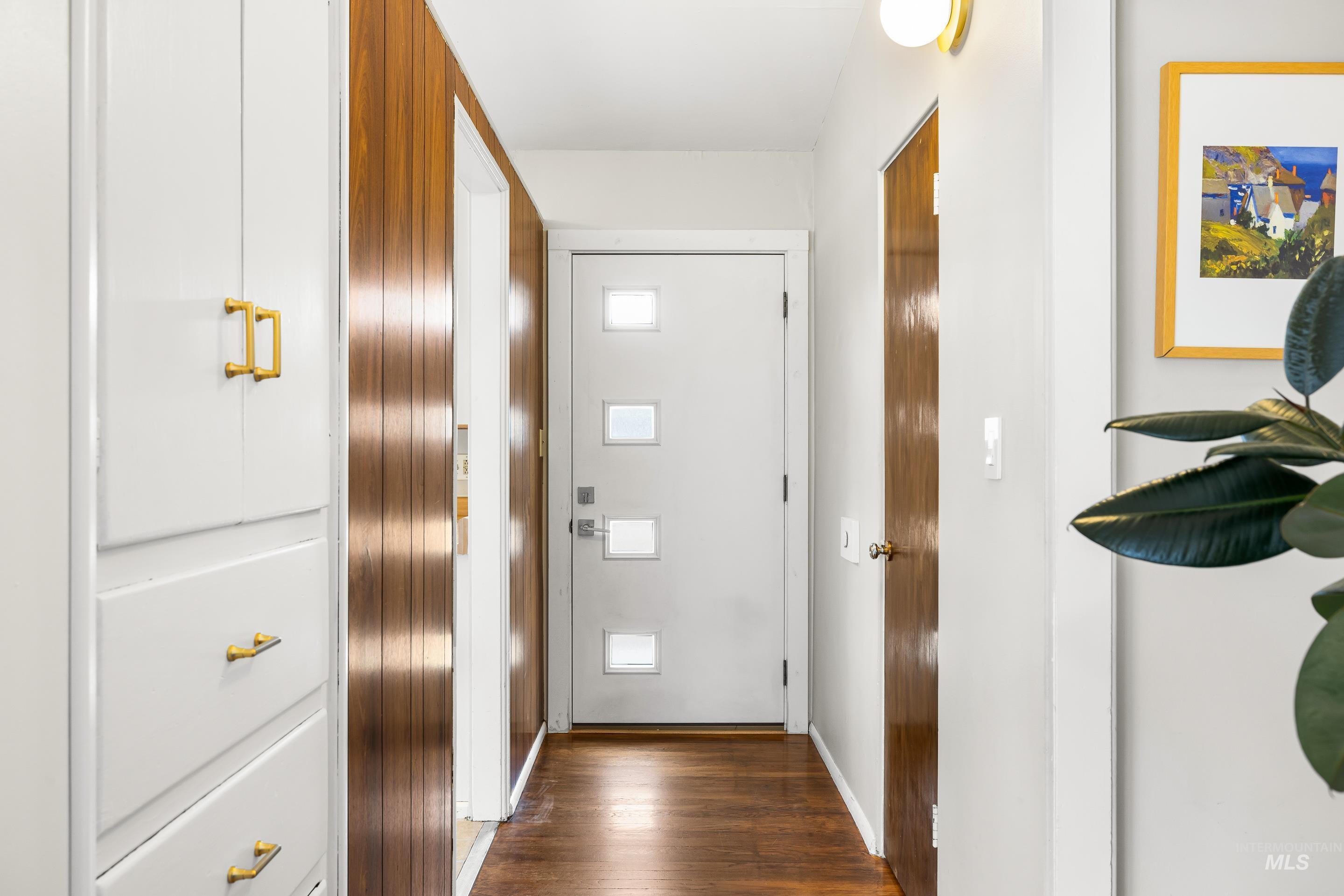 2824 West Kathryn Street Boise, ID 83705 - Photo 4 of 40 Doorway to outside with wood finished floors and baseboards