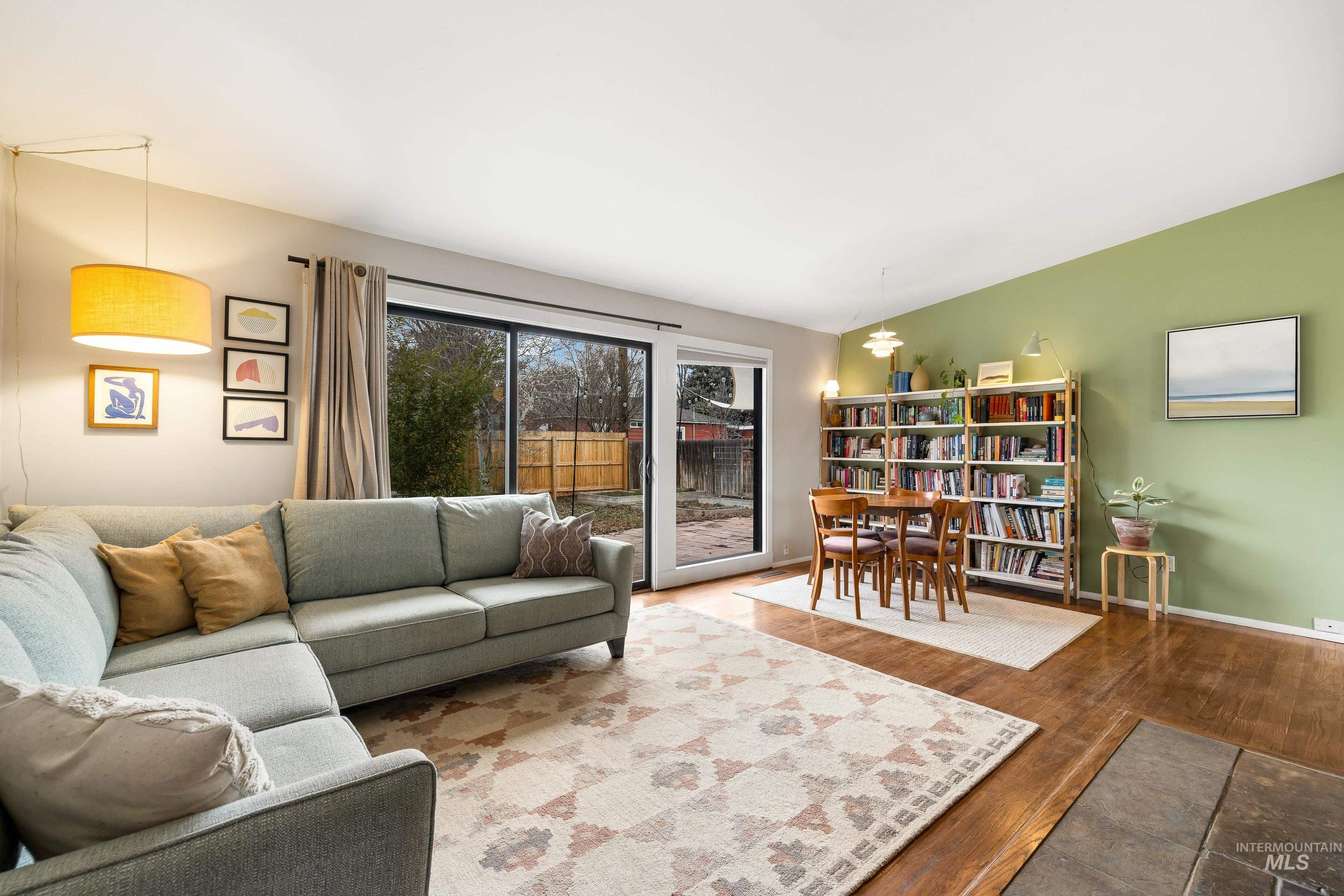 2824 West Kathryn Street Boise, ID 83705 - Photo 6 of 40 Living area with wood finished floors and baseboards