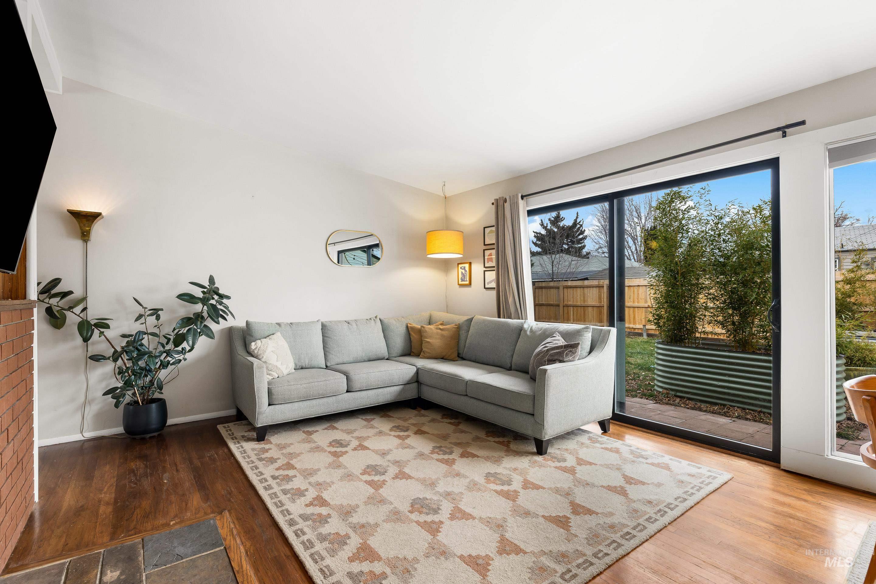 2824 West Kathryn Street Boise, ID 83705 - Photo 7 of 40 Living room with wood finished floors and baseboards